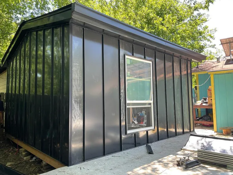 Black standing seam metal wall panels for Metal Roof Installation in Galesburg