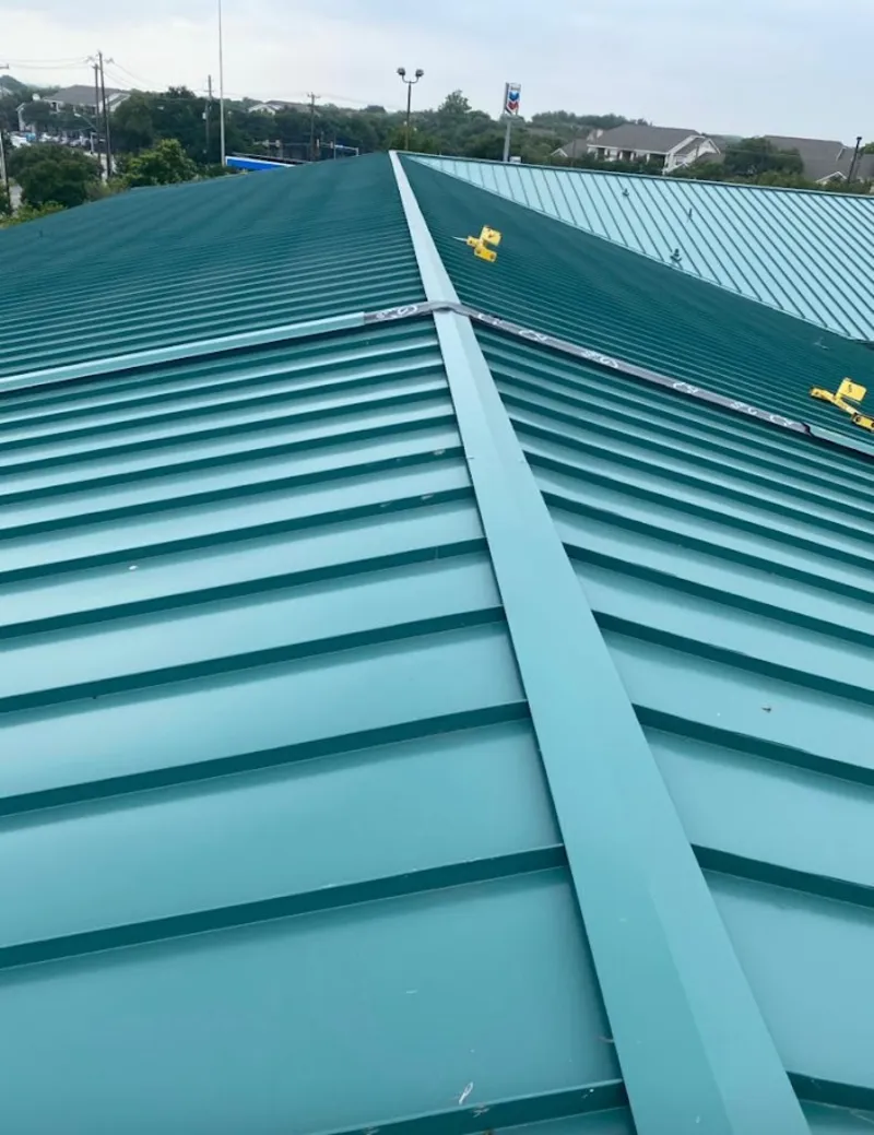Green commercial metal roof ridge and valley for Metal Roof Repair in Galesburg