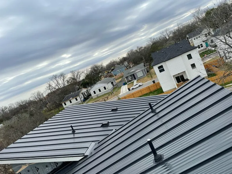 Standing seam metal roof panels with vents for Skylight Repair in Galesburg